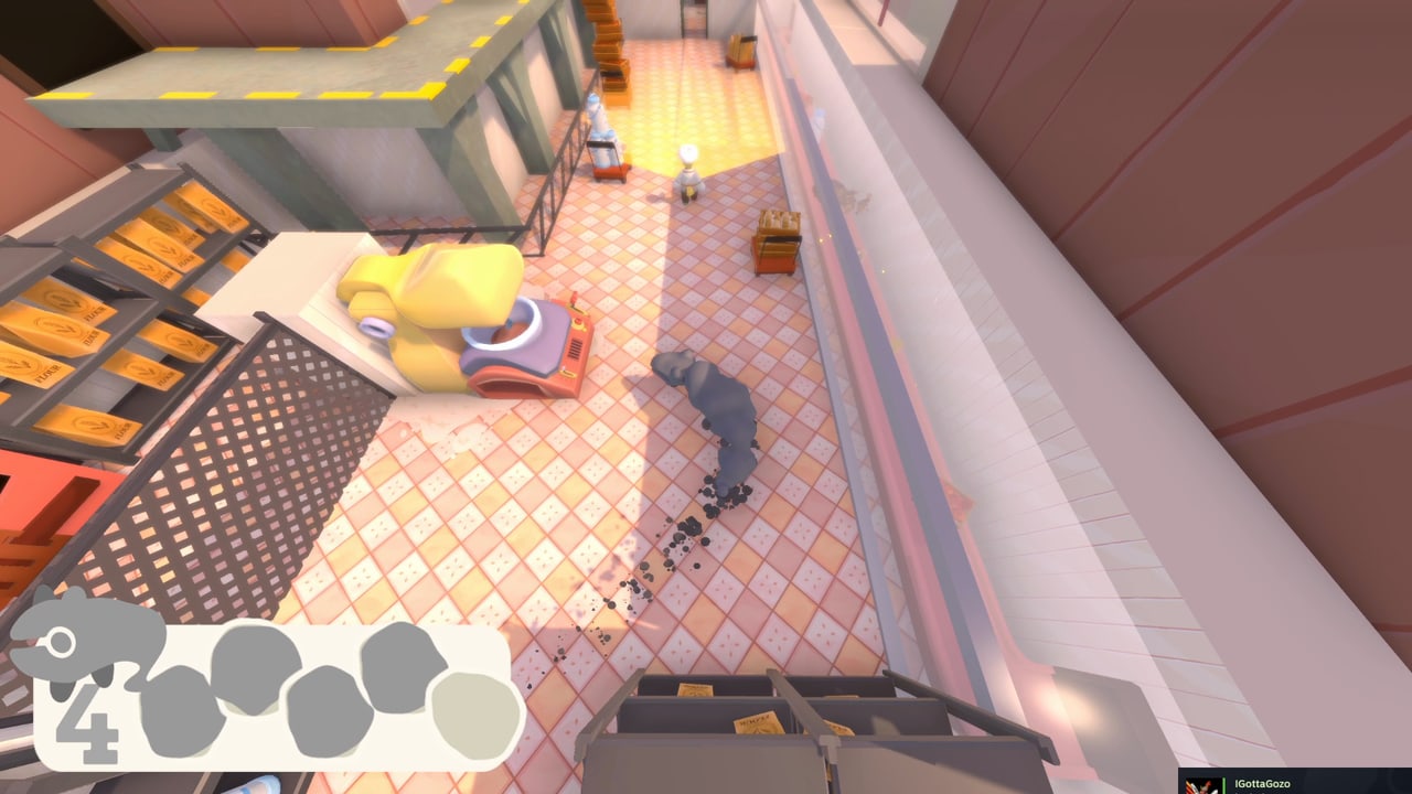 Applewood hits a yellow bakery machine until it breaks, then slips away down the hall